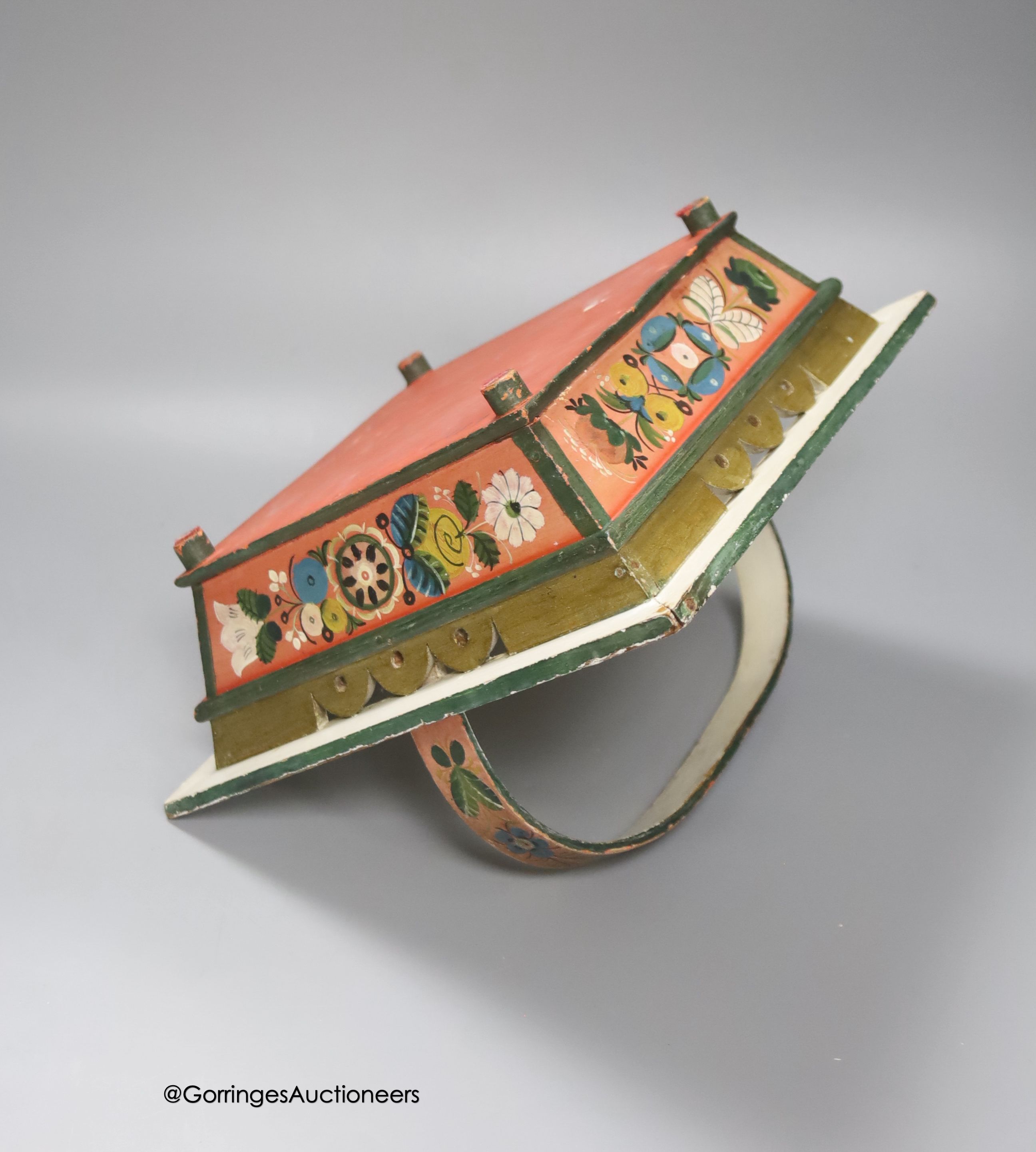 A Norwegian wood basket, painted with script and flowers in polychrome, 25cm